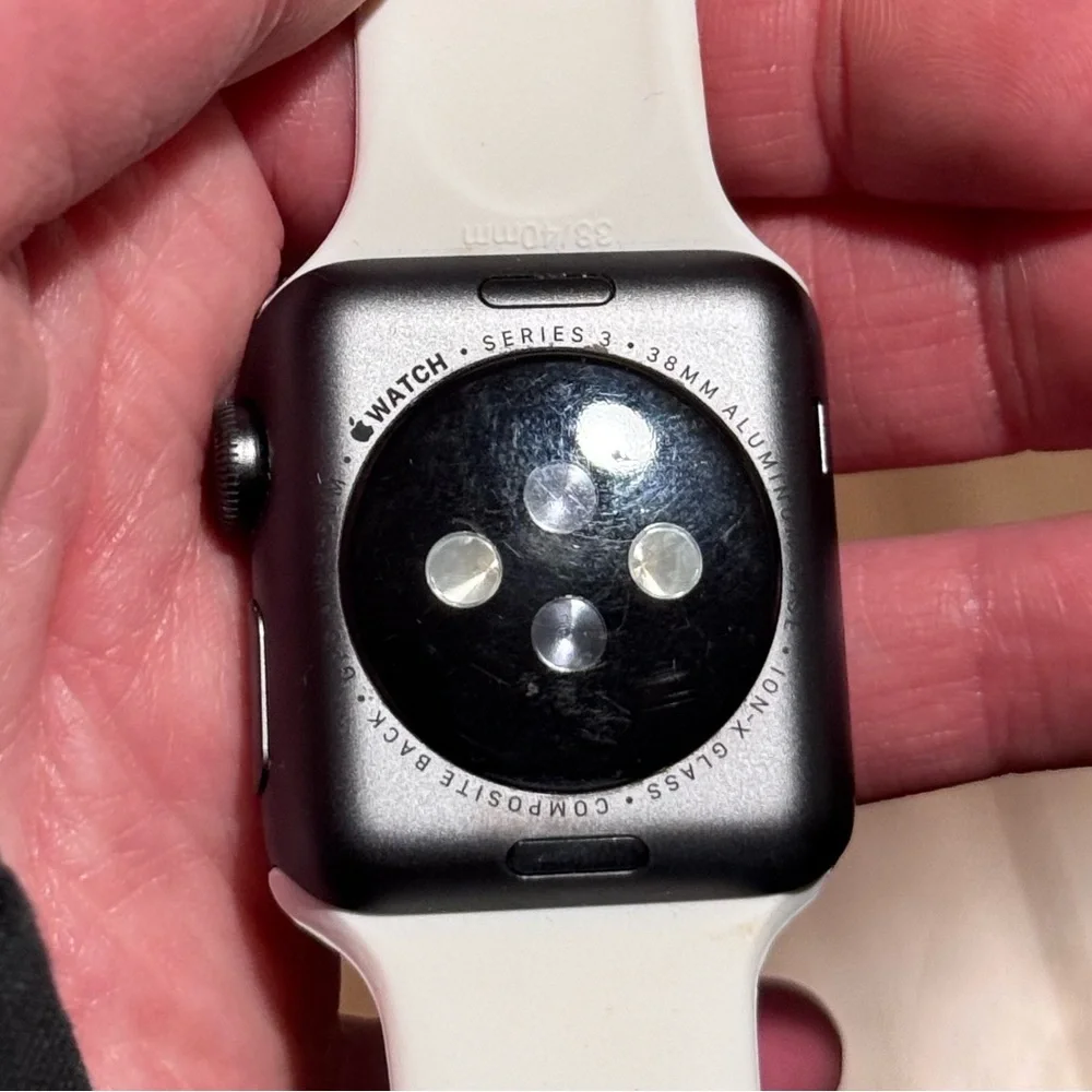 Series 3 Black Apple Watch with 38/40mm white apple silicone band